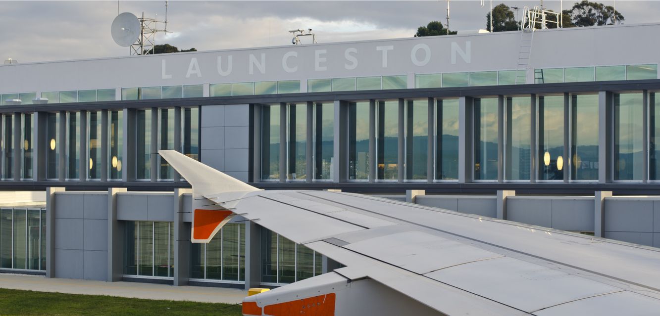 Launceston Airport building showing wing of plane.