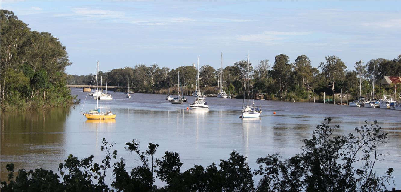 Boats anchored on the Mary River in Maryborough, Queensland.