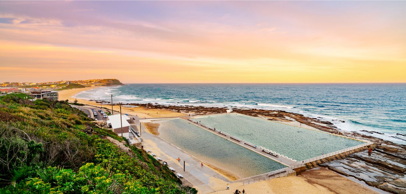 Sunset at Merewether beach overlooking the Merewether ocean baths in Newcastle.