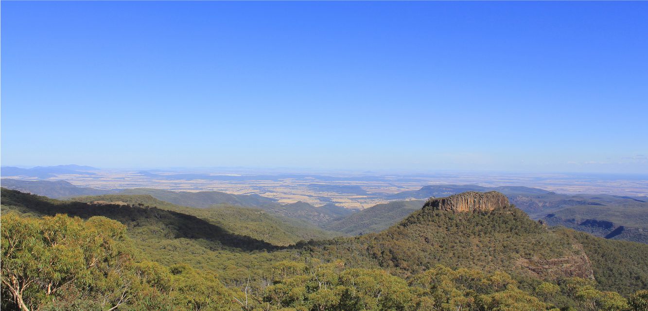 An expansive view of Euglah Rock and the Nandewar Range from the Doug Sky Lookout, Mt Kaputar, near Narrabri.