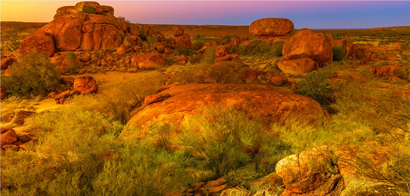 The famous Devils Marbles lie south of Tennant Creek in the Northern Territory.