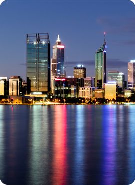 Perth, Western Australia, viewed at night reflected in the Swan River.