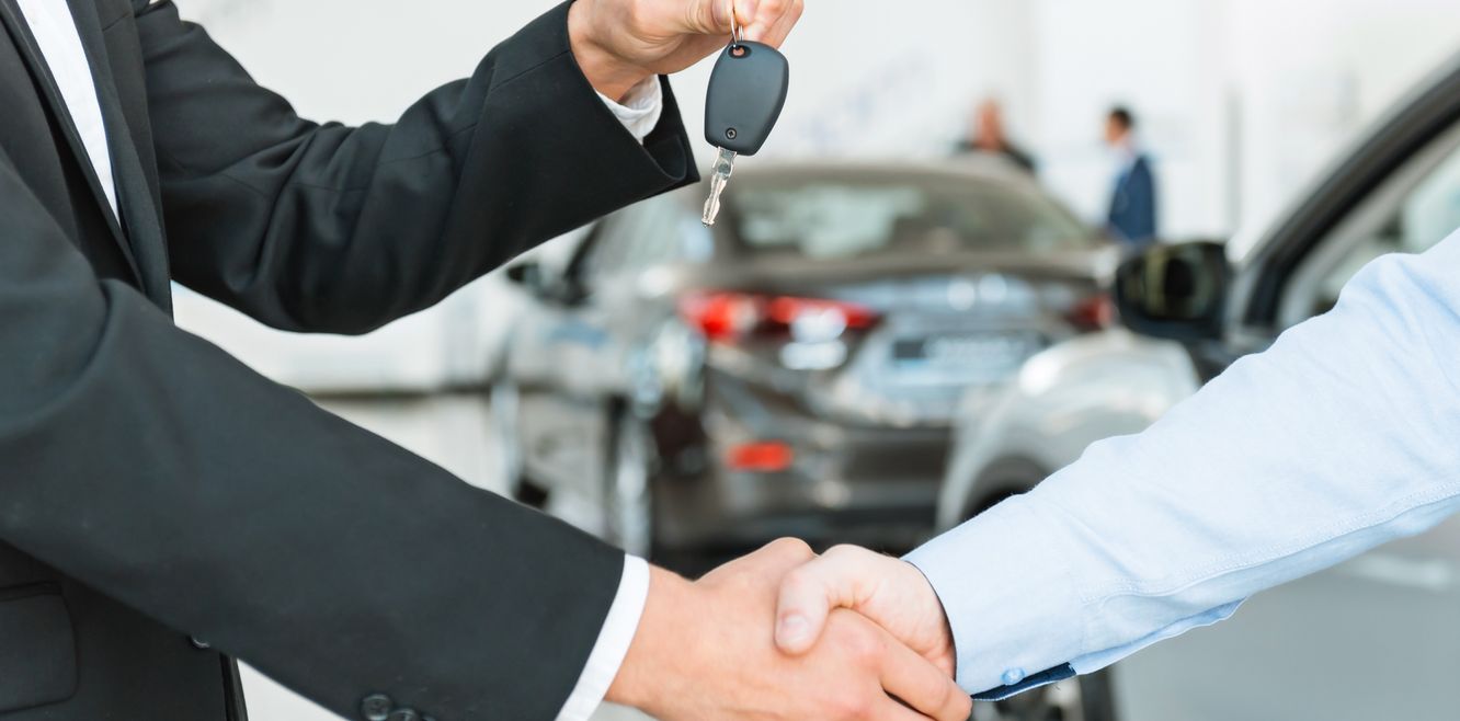 Handing over the key to a rental car