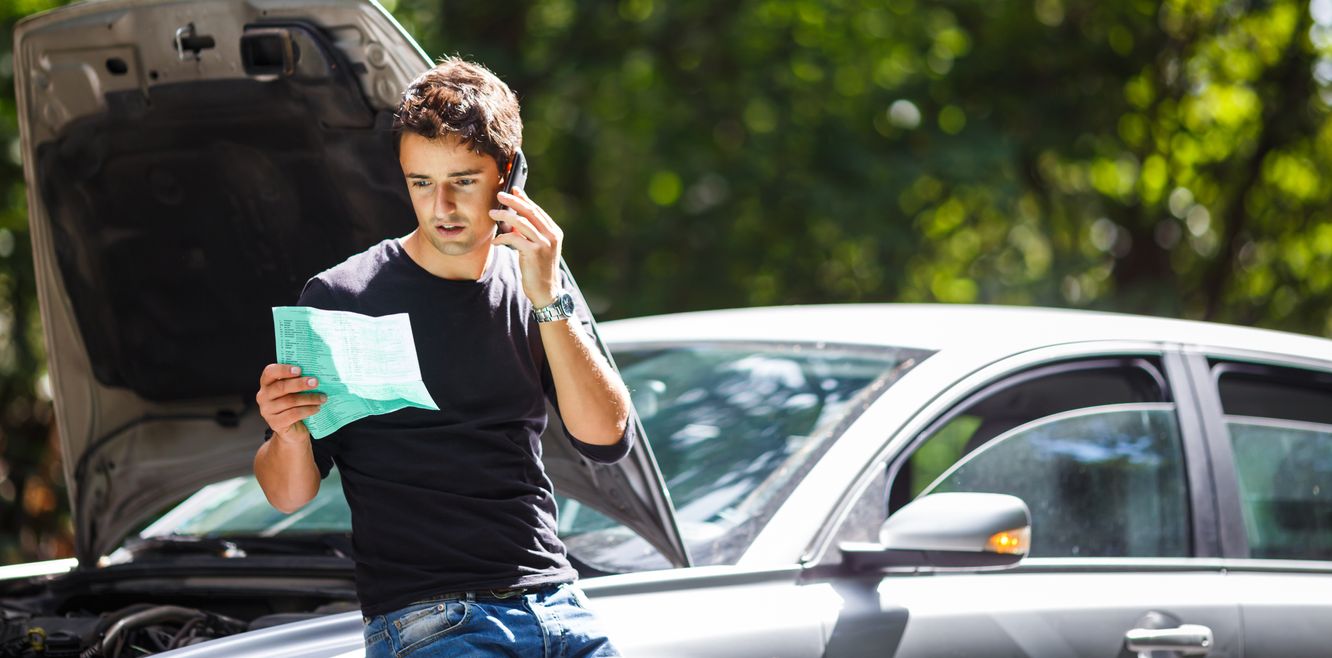 Man calling roadside assistance