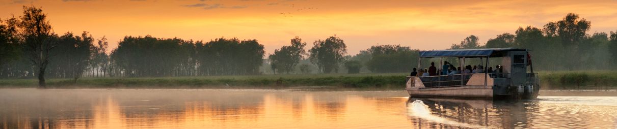 Boat on Yellow Water billabong at dawn, Northern Territory, Australia.