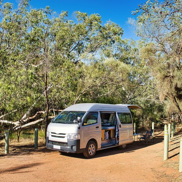 A campervan parked near Ellendale Pool.