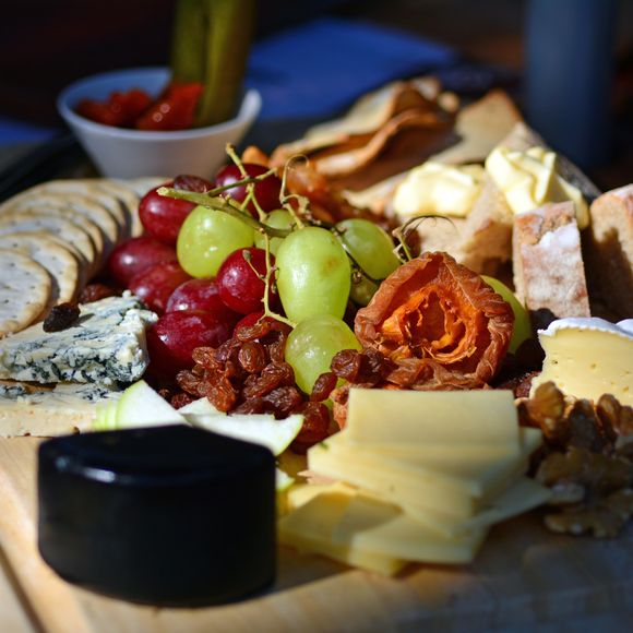 Enjoy a cheese plate with grapes and dried fruits at Mount Tamborine.